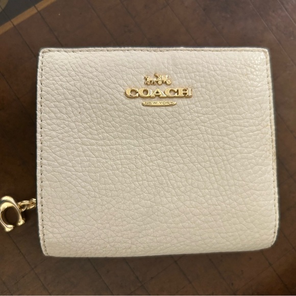 Coach Handbags - Coach Outlet Snap Wallet White Pebbled Leather with Gold.